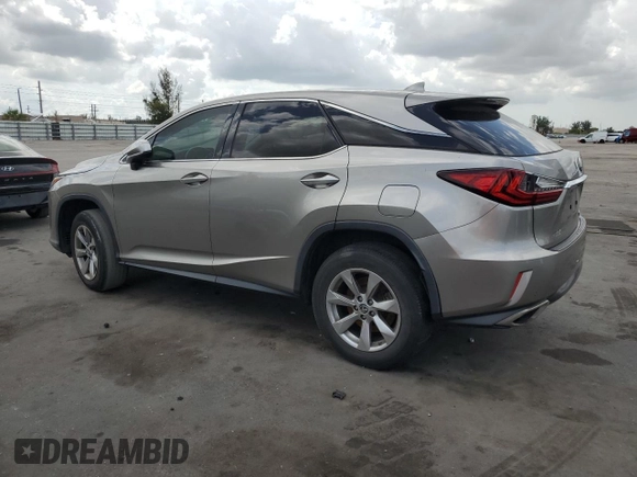 2018 Lexus RX with VIN 2T2ZZMCA1JC097950, listed as a Copart auction lot 52696205 with 152,856 mi miles and Clean Title. Bid and sale history available at carsss.com. Image 2.