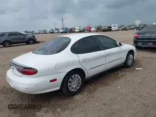 1998 Ford Taurus LX z VIN 1FAFP52U7WA146892, wystawiony jako IAAI lot #42313955 z przebiegiem 133 743 mil mil oraz . Historia ofert i sprzedaży dostępna na DreamBid. Obrazek 4.