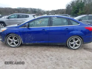 2015 Ford Focus Titanium with VIN 1FADP3J27FL298882, listed as a IAAI auction lot 42117247 with 124,185 mi miles and . Bid and sale history available at carsss.com. Image 14.