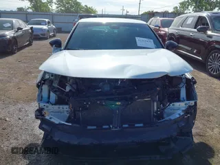 2022 Honda Civic Sport z VIN 2HGFE2F54NH599290, wystawiony jako IAAI lot #42212435 z przebiegiem 49 012 mil mil oraz . Historia ofert i sprzedaży dostępna na DreamBid. Obrazek 13.