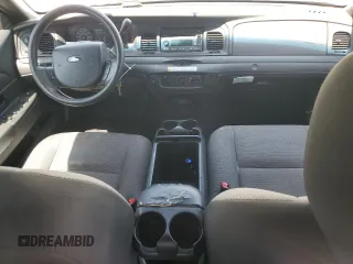 2011 Ford Police Interceptor with VIN 2FABP7BV4BX167977, listed as a Copart auction lot 61819025 with 104,769 mi miles and Salvage title. Bid and sale history available at DreamBid. Image 8.