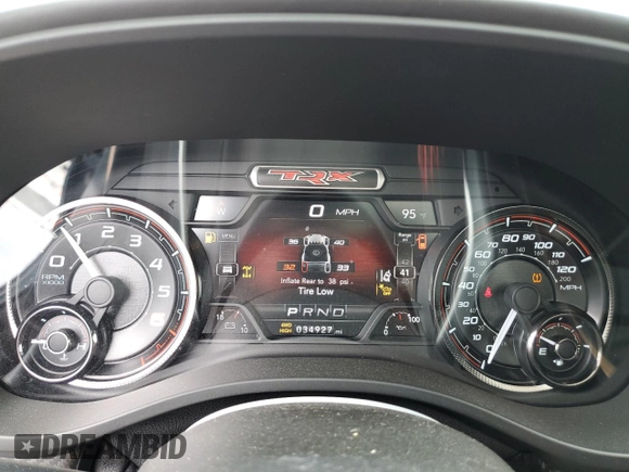 2021 Ram 1500 with VIN 0K1905786880, listed as a Copart auction lot 61756114 with 34,927 mi miles and Clean title. Bid and sale history available at DreamBid. Image 9.