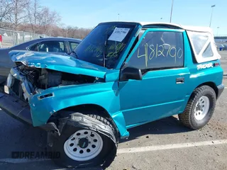 1996 Chevrolet Tracker z VIN 2CNBE1866T6936852, wystawiony jako IAAI lot #41812790 z przebiegiem 72 762 mil mil oraz . Historia ofert i sprzedaży dostępna na DreamBid. Obrazek 6.