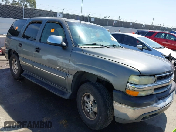 2002 Chevrolet Tahoe LS z VIN 1GNEC13V92R305304, wystawiony jako IAAI lot #41851210 z przebiegiem Nie podano mil oraz . Historia ofert i sprzedaży dostępna na DreamBid. Obrazek 1.