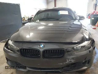 2015 BMW 3 Series 328i xDrive with VIN WBA3B5G53FNS17413, listed as a IAAI auction lot 41643479 with 99,065 mi miles. Bid and sale history available at carsss.com. Image 12.