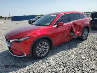 2023 Mazda CX-9 Grand Touring z VIN JM3TCBDY4P0633408, wystawiony jako Copart lot #57242685 z przebiegiem 28 859 mil mil oraz Szkoda całkowita • Salvage title. Historia ofert i sprzedaży dostępna na DreamBid. Obrazek 1.