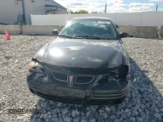 1999 Pontiac Grand Am SE2 with VIN 1G2NE52E2XM732523, listed as a Copart auction lot 75420684 with 124,110 mi miles and Salvage title. Bid and sale history available at DreamBid. Image 10.
