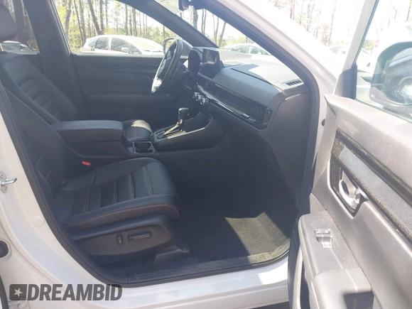 2023 Honda CR-V Sport Touring with VIN 5J6RS6H90PL003877, listed as a IAAI auction lot 41938027 with 38,500 mi miles and . Bid and sale history available at DreamBid. Image 5.