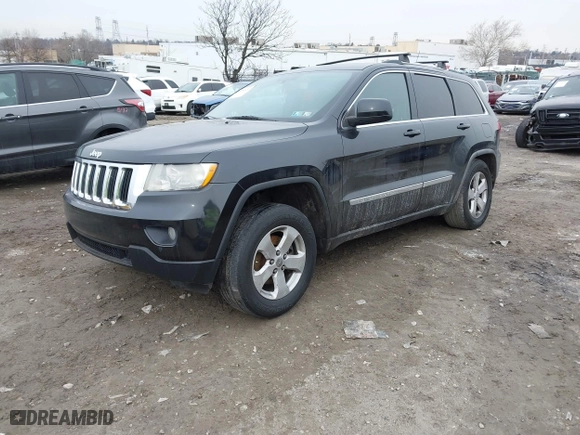 2011 Jeep Grand Cherokee Laredo with VIN 1J4RR4GGXBC511475, listed as a IAAI auction lot 41554620 with 164,361 mi miles. Bid and sale history available at carsss.com. Image 17.