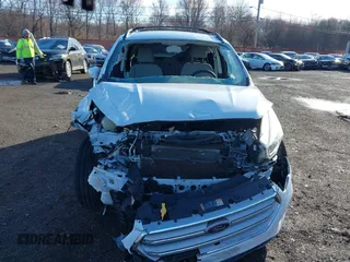 2017 Ford Escape SE with VIN 1FMCU9GD5HUE00425, listed as a IAAI auction lot 41843115 with 64,896 mi miles. Bid and sale history available at carsss.com. Image 12.