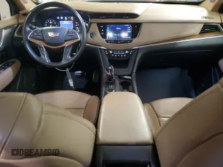 2021 Cadillac XT5 AWD Sport with VIN 1GYKNHRS1MZ103033, listed as a Copart auction lot 58586425 with 65,229 mi miles and Salvage title. Bid and sale history available at DreamBid. Image 8.