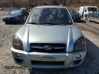 2005 Hyundai Tucson GL with VIN KM8JM12B95U185156, listed as a Copart auction lot 49605355 with 103,367 mi miles and Salvage Title. Bid and sale history available at carsss.com. Image 5.