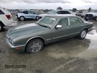 1995 Jaguar XJ с VIN SAJKX1748SC747688, выставлен на аукционе Copart как лот 50992475 с пробегом 99 249 миль миль и Списание • Salvage title. История ставок и продаж доступна на DreamBid. Изображение 1.