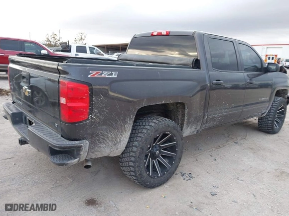 2016 Chevrolet Silverado 1500 LT with VIN 3GCUKREC0GG252047, listed as a IAAI auction lot 41004266 with 170,817 mi miles. Bid and sale history available at carsss.com. Image 4.
