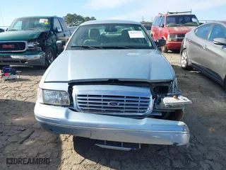 2005 Ford Crown Victoria LX with VIN 2FAFP74W65X135964, listed as a IAAI auction lot 41271175 with 82,494 mi miles. Bid and sale history available at carsss.com. Image 12.