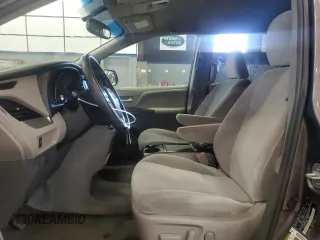 2015 Toyota Sienna LE with VIN 5TDJK3DC7FS105502, listed as a Copart auction lot 61672045 with 183,035 mi miles and Clean title. Bid and sale history available at DreamBid. Image 7.