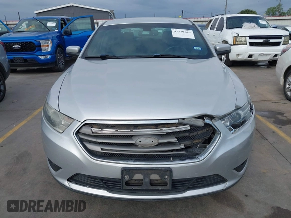2015 Ford Taurus SEL z VIN 1FAHP2E88FG133328, wystawiony jako IAAI lot #42179649 z przebiegiem 127 171 mil mil oraz . Historia ofert i sprzedaży dostępna na DreamBid. Obrazek 17.