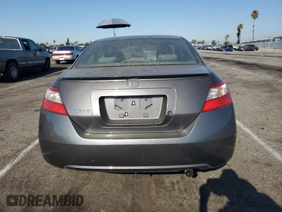 2010 Honda Civic Cpe LX with VIN 2HGFG1B61AH529839, listed as a Copart auction lot 69501724 with 218,443 mi miles and Salvage Title. Bid and sale history available at carsss.com. Image 6.