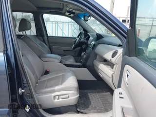 2012 Honda Pilot EX-L with VIN 5FNYF4H79CB004810, listed as a IAAI auction lot 42127547 with 143,461 mi miles and . Bid and sale history available at DreamBid. Image 5.