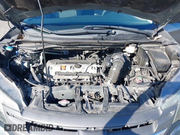 2014 Honda CR-V LX with VIN 2HKRM4H3XEH621242, listed as a IAAI auction lot 41734669 with 127,664 mi miles. Bid and sale history available at carsss.com. Image 10.