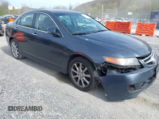 2006 Acura TSX with VIN JH4CL968X6C040128, listed as a IAAI auction lot 42054197 with 245,884 mi miles. Bid and sale history available at carsss.com. Image 1.