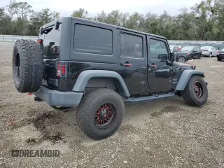 2018 Jeep Wrangler JK Unlimited Sport S with VIN 1C4BJWDG0JL818800, listed as a Copart auction lot 88286715 with 114,011 mi miles and Salvage Title. Bid and sale history available at carsss.com. Image 3.