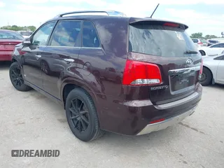 2012 Kia Sorento SX with VIN 5XYKWDA25CG249584, listed as a IAAI auction lot 42008349 with 214,381 mi miles. Bid and sale history available at carsss.com. Image 3.