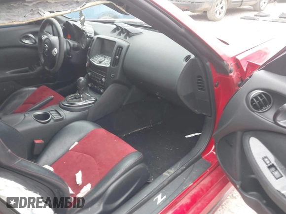 2016 Nissan 370Z Sport z VIN JN1AZ4EH7GM931035, wystawiony jako IAAI lot #42311165 z przebiegiem 83 947 mil mil oraz . Historia ofert i sprzedaży dostępna na DreamBid. Obrazek 5.