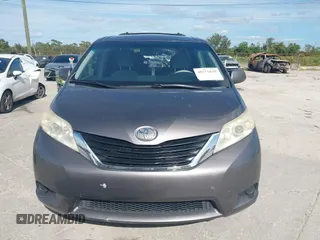 2014 Toyota Sienna LE AAS with VIN 5TDKK3DCXES432611, listed as a IAAI auction lot 40771635 with 214,145 mi miles and . Bid and sale history available at carsss.com. Image 13.