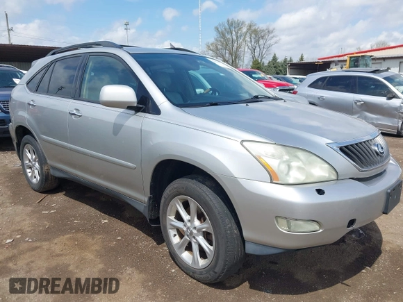 2008 Lexus RX with VIN 2T2HK31U58C053306, listed as a IAAI auction lot 42066973 with 184,266 mi miles. Bid and sale history available at carsss.com. Image 1.