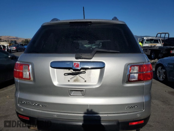 2007 Saturn Outlook XR z VIN 5GZEV23757J140706, wystawiony jako Copart lot #73027824 z przebiegiem 188 400 mil mil oraz Szkody całkowita. Historia ofert i sprzedaży dostępna na DreamBid. Obrazek 6.