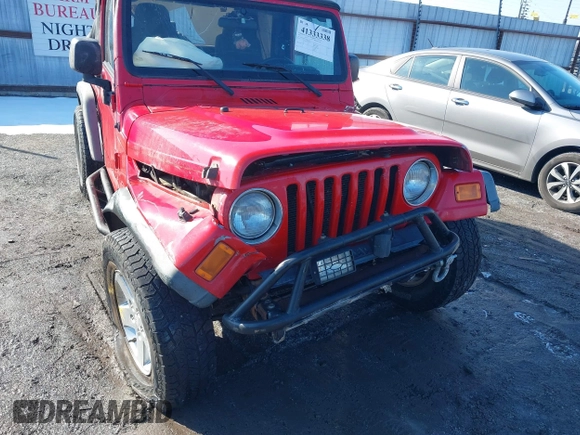 2005 Jeep Wrangler X with VIN 1J4FA39S95P385581, listed as a IAAI auction lot 41333338 with 150,010 mi miles and . Bid and sale history available at DreamBid. Image 6.