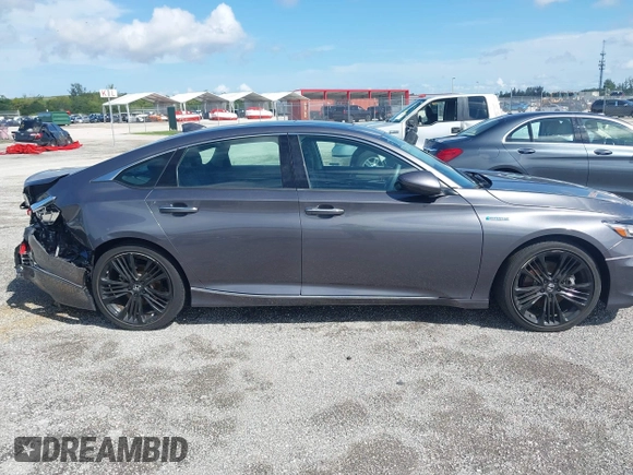 2022 Honda Accord Touring with VIN 1HGCV3F91NA031010, listed as a IAAI auction lot 40302407 with 18,820 mi miles and . Bid and sale history available at DreamBid. Image 13.