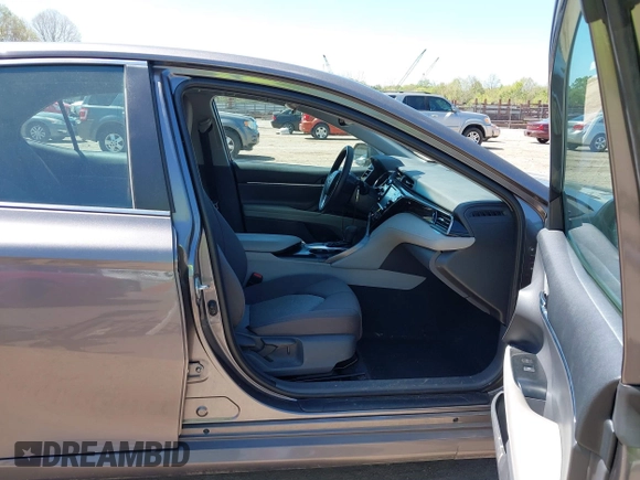 2019 Toyota Camry LE with VIN 4T1B11HK8KU289721, listed as a IAAI auction lot 42021107 with 69,828 mi miles and . Bid and sale history available at DreamBid. Image 5.