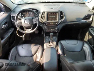 2019 Jeep Cherokee Trailhawk with VIN 1C4PJMBX7KD277477, listed as a Copart auction lot 58969705 with 139,521 mi miles and Salvage title. Bid and sale history available at DreamBid. Image 8.