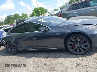 2014 Tesla Model S P85D with VIN 5YJSA1H29EFP63032, listed as a IAAI auction lot 42132145 with Not Provided miles and . Bid and sale history available at DreamBid. Image 12.