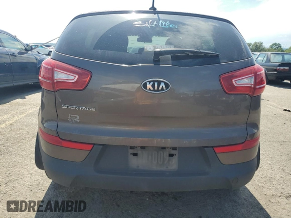 2011 Kia Sportage LX with VIN KNDPBCA2XB7110381, listed as a Copart auction lot 65434035 with 117,025 mi miles and Salvage title. Bid and sale history available at DreamBid. Image 6.