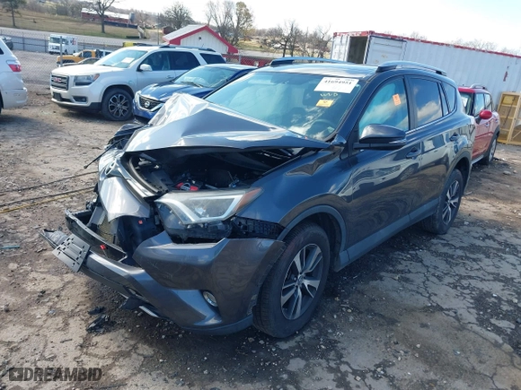 2016 Toyota RAV4 XLE with VIN 2T3RFREV4GW437875, listed as a IAAI auction lot 41694951 with 136,098 mi miles. Bid and sale history available at carsss.com. Image 2.