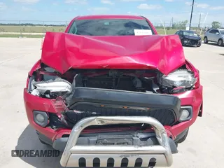 2016 Toyota Tacoma SR5 with VIN 5TFAX5GN2GX059826, listed as a IAAI auction lot 42032005 with 209,271 mi miles. Bid and sale history available at carsss.com. Image 12.