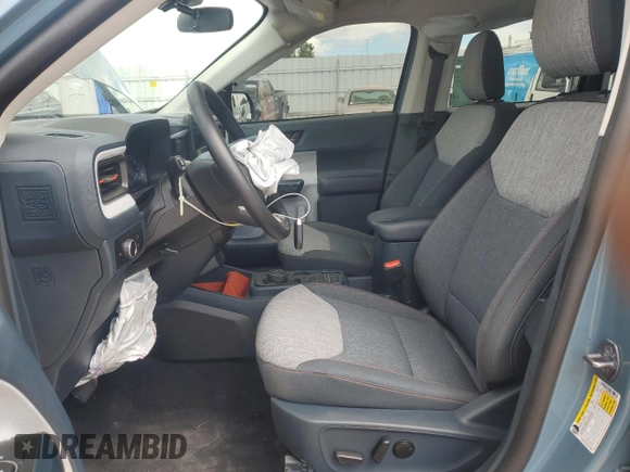 2023 Ford Maverick XL with VIN 3FTTW8F9XPRA99145, listed as a Copart auction lot 56218175 with 15,697 mi miles and Salvage title. Bid and sale history available at DreamBid. Image 7.