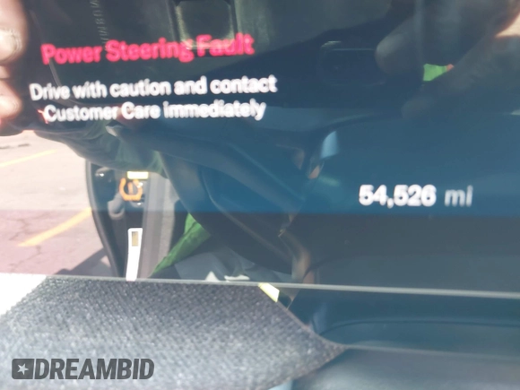 2023 Lucid Air Pure z VIN 50EA1PFA6PA009358, wystawiony jako IAAI lot #41950291 z przebiegiem 54 526 mil mil oraz . Historia ofert i sprzedaży dostępna na DreamBid. Obrazek 7.