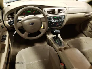2004 Ford Taurus SE with VIN 1FAFP53U74G122231, listed as a Copart auction lot 42904044 with 116,851 mi miles and Salvage Title. Bid and sale history available at DreamBid. Image 8.