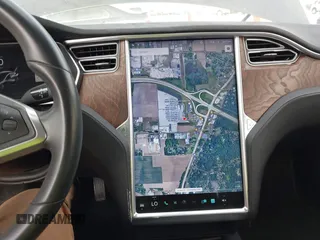 2017 Tesla Model S 100D with VIN 5YJSA1E28HF188981, listed as a IAAI auction lot 42010115 with 76,327 mi miles and . Bid and sale history available at DreamBid. Image 18.