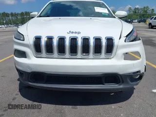 2016 Jeep Cherokee Latitude with VIN 1C4PJLCB0GW291357, listed as a IAAI auction lot 42312356 with 105,692 mi miles and . Bid and sale history available at DreamBid. Image 6.