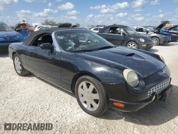 2002 Ford Thunderbird Hardtop Premium with VIN 1FAHP60A12Y120989, listed as a Copart auction lot 77573084 with Not Provided miles and Salvage Title. Bid and sale history available at DreamBid. Image 4.