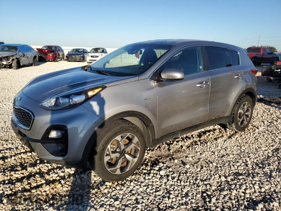 2021 Kia Sportage LX with VIN KNDPMCAC0M7945282, listed as a Copart auction lot 79599224 with 84,685 mi miles and Clean Title. Bid and sale history available at carsss.com. Image 1.