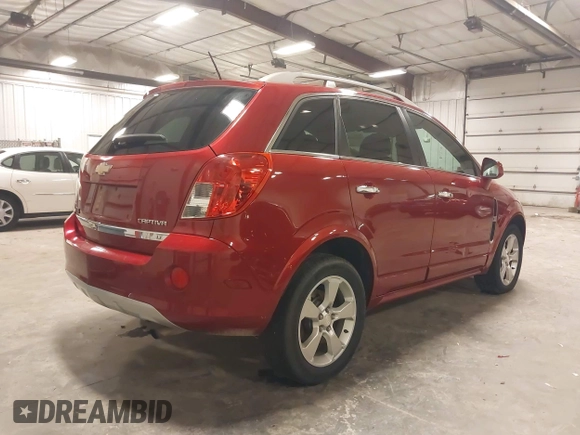2014 Chevrolet Captiva Sport LT z VIN 3GNAL3EK2ES609279, wystawiony jako IAAI lot #42135344 z przebiegiem 46 330 mil mil oraz . Historia ofert i sprzedaży dostępna na DreamBid. Obrazek 4.