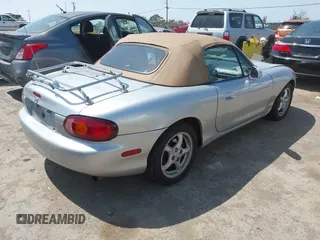 1999 Mazda MX-5 Miata with VIN JM1NB3539X0131393, listed as a IAAI auction lot 42439850 with 210,710 mi miles and . Bid and sale history available at DreamBid. Image 4.