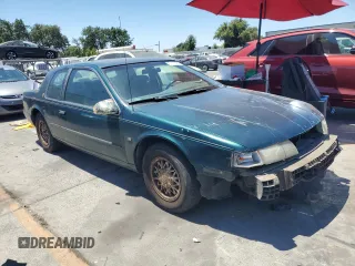 1995 Mercury Cougar z VIN 1MELM62W5SH627799, wystawiony jako Copart lot #61115064 z przebiegiem 31 957 mil mil oraz Szkody całkowita. Historia ofert i sprzedaży dostępna na DreamBid. Obrazek 4.