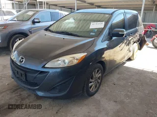 2015 Mazda Mazda5 Sport with VIN JM1CW2BL6F0190989, listed as a IAAI auction lot 41783326 with 90,505 mi miles. Bid and sale history available at carsss.com. Image 2.